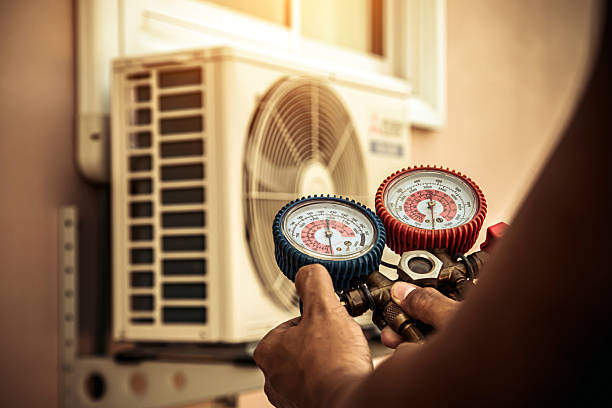Professional Heat Pump Repair technician working in Peninsula, OH